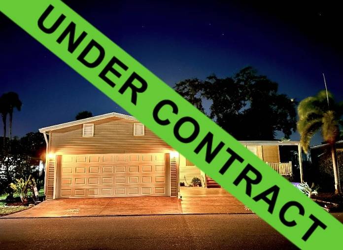 Ellenton, FL Mobile Home for Sale located at 210 Holland St Colony Cove